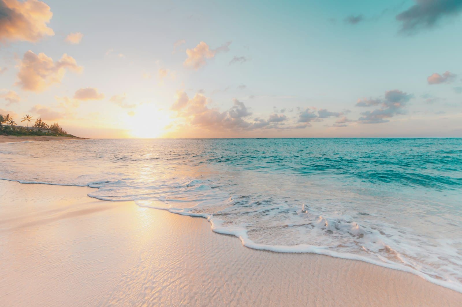Sunset over a turquoise beach